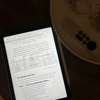 Tablet displaying a document on a table with a remote control in the background
